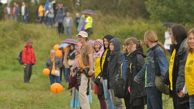 Thousands of anti-coal protestors form 8km 'human chain' against lignite mining. Photographer: Bogusz Bilewski