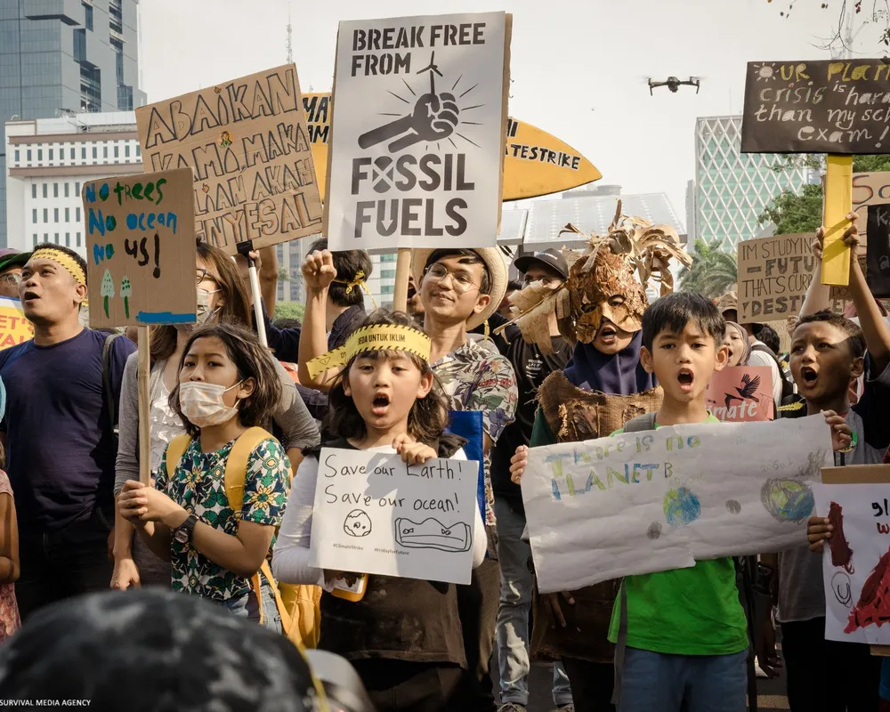 Activists march for an end to fossil fuels.