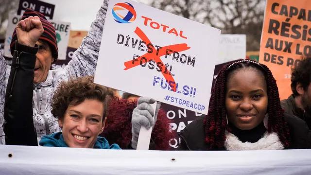 20220312_Total_StopEACOP_Climate_March_Paris_France_AG_6-scaled.jpg