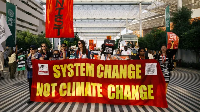 Civil society organisations and activist take part in the Global Day of Action for Climate Justice at COP28 in Dubai, UAE.