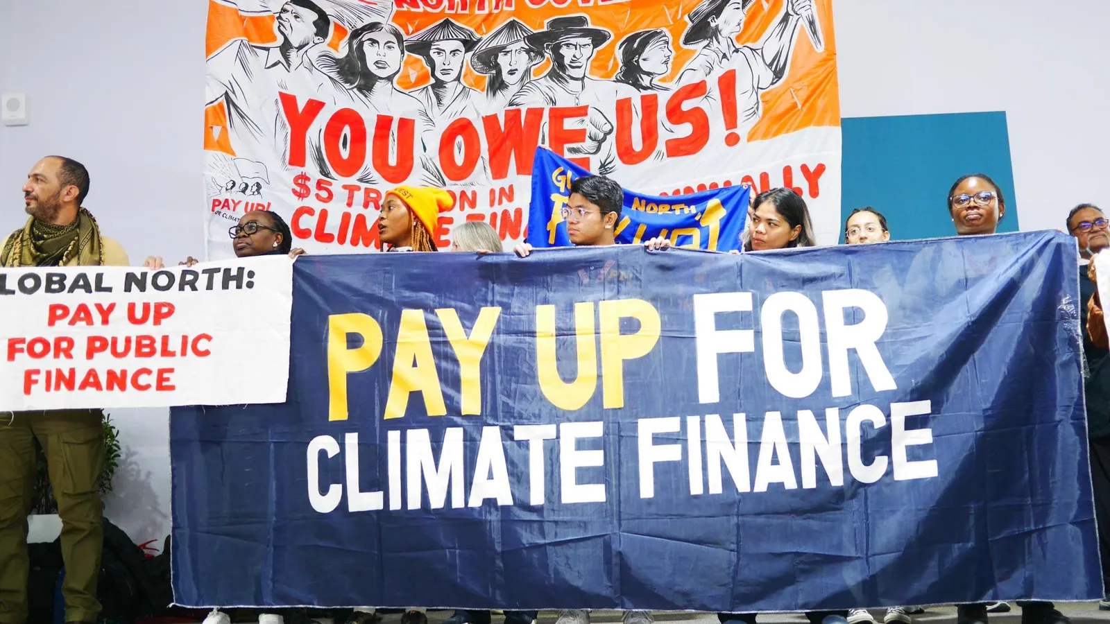 People power in action at the UN Climate Change Conference, advocating for climate finance solutions to drive a just and sustainable future.