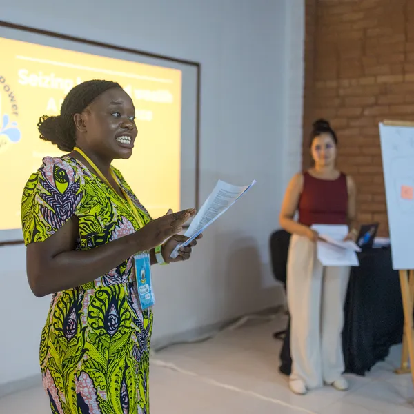 Activists giving presentation to a group.