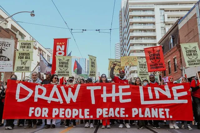 Thousands rallied in Toronto, Canada to Draw The Line. Photo: Sarah Hassanein