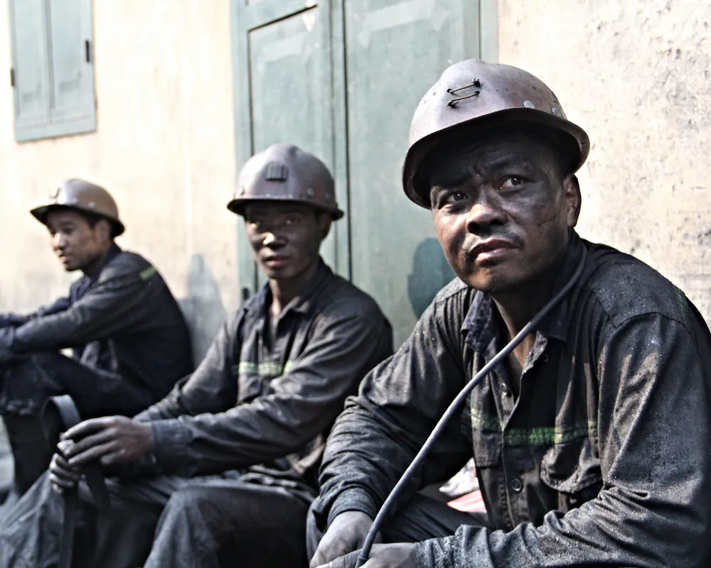 Miners who just finished their shift at Vang Danh. Photo: Silver Chiang.