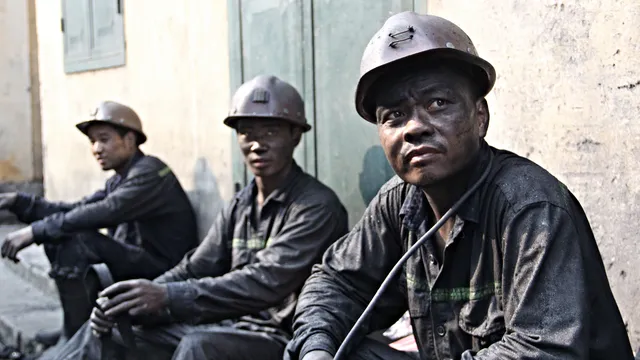 Miners who just finished their shift at Vang Danh. Photo: Silver Chiang.