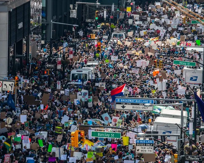 People power in action at the UN Climate Change Conference, advocating for climate finance solutions to drive a just and sustainable future.