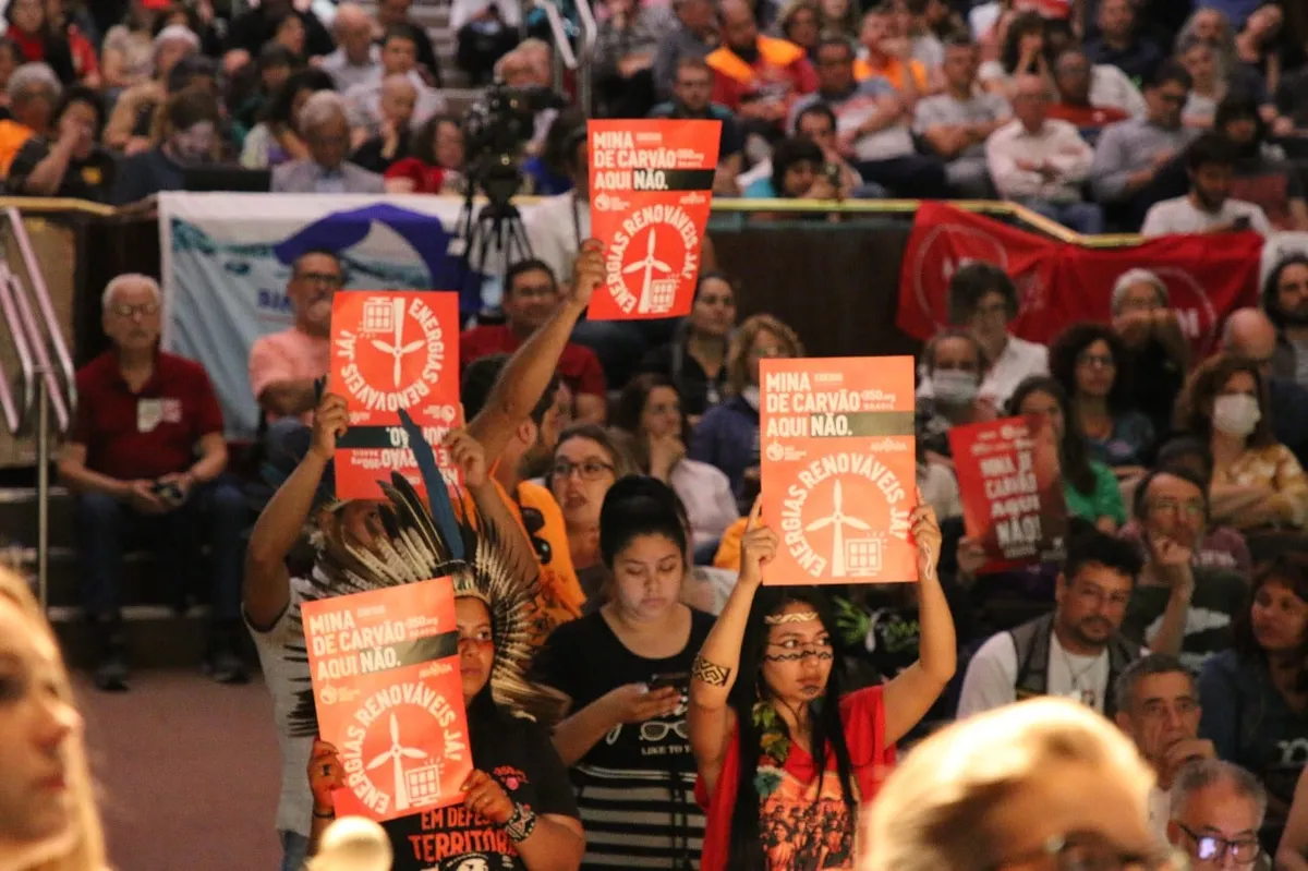 Activists protest against the Guaíba coal mine during a public hearing, Porto Alegre, Brazil.