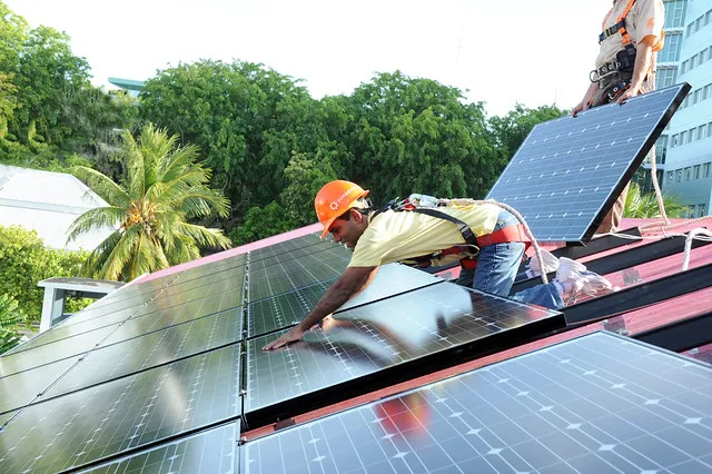 To kick off the Global Work Party, President Mohamed Nasheed of the Maldives installs solar panels donated by Sungevity.  The event came just two days after the Obama Administration's announcement that the White House is going solar. 