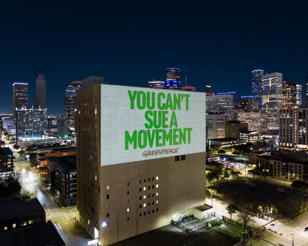 SLAPP 'We Will Not Be Silenced' Projections in Houston. © Greenpeace