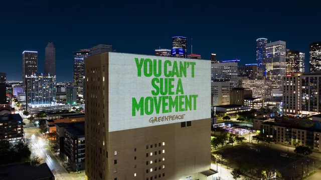 SLAPP 'We Will Not Be Silenced' Projections in Houston. © Greenpeace
