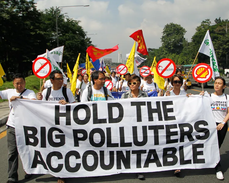Petitioners including former Climate Change Commissioner, Yeb Sano, was among those present in demanding climate liability. Photo: AC Dimatatac
