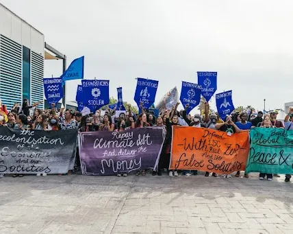 Activists hold an action at COP27 in Sharm El-Sheikh, Egypt..