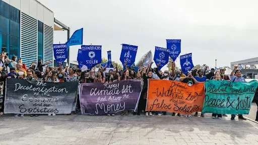 Activists hold an action at COP27 in Sharm El-Sheikh, Egypt..