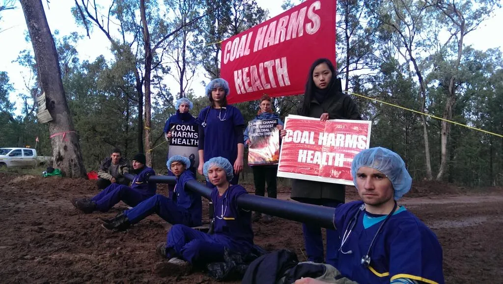 Dr Harry Jennens (in the foreground), with the "Medics Against Coal" taking direct action to stop the Maules Creek coal mine in Australia.