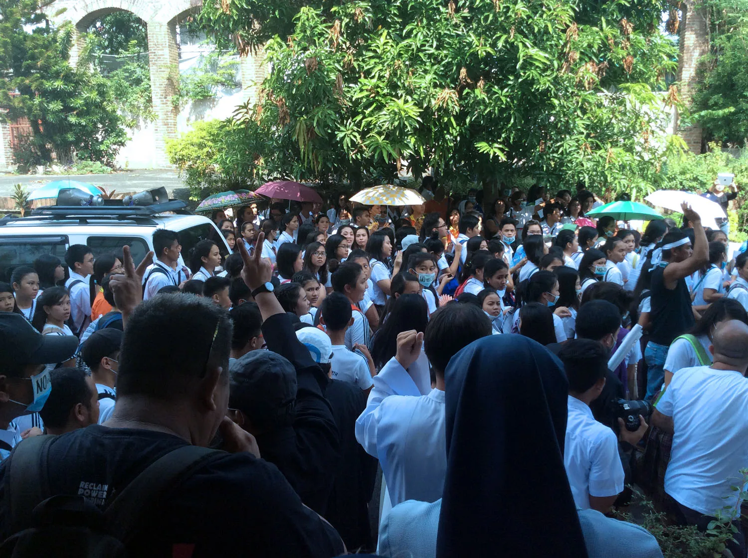 The crowd was quick to respond to the appeal to halt the exit of the board members. Photo: Fread De Mesa