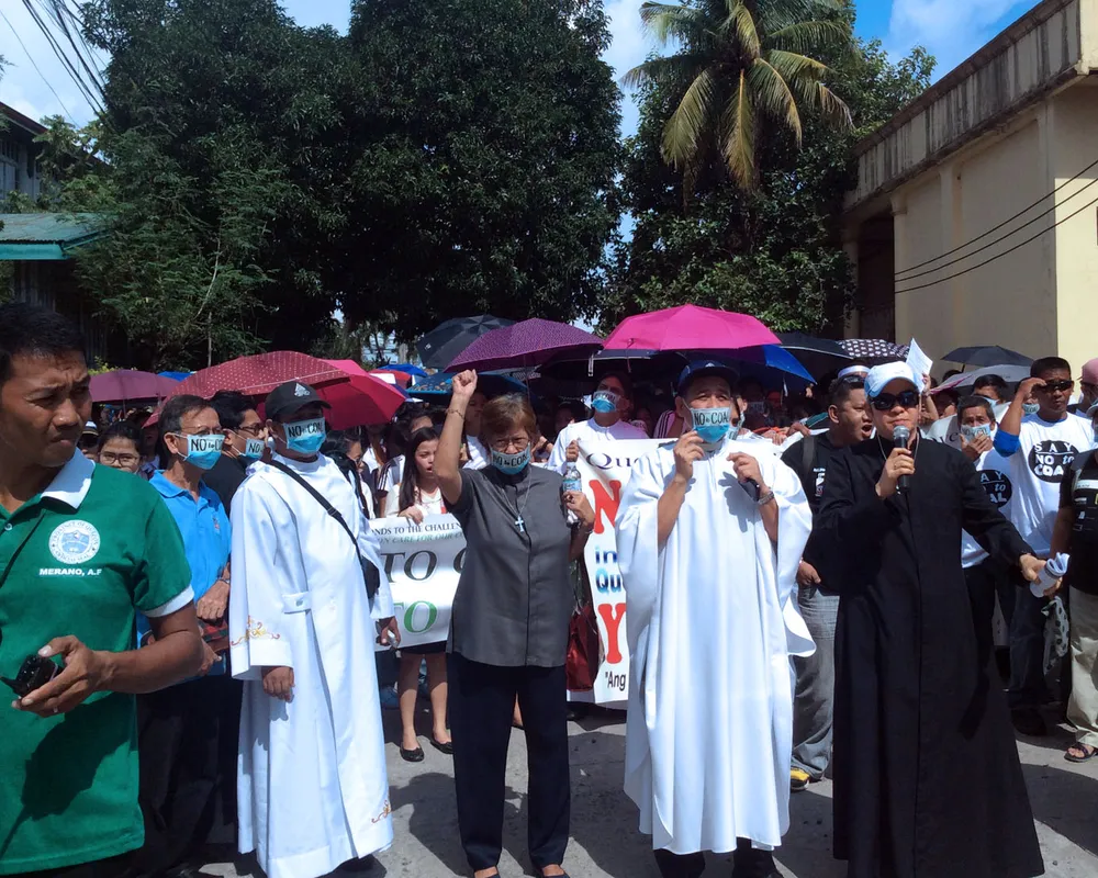 The march was organized by leaders from both Protestant and Roman Catholic churches who have been working to form common witness to social issues as the Quezon Ecumenical Movement. Photo: Fread De Mesa