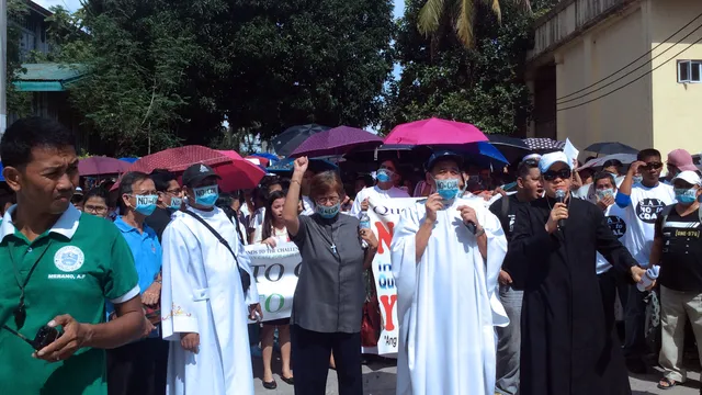 The march was organized by leaders from both Protestant and Roman Catholic churches who have been working to form common witness to social issues as the Quezon Ecumenical Movement. Photo: Fread De Mesa