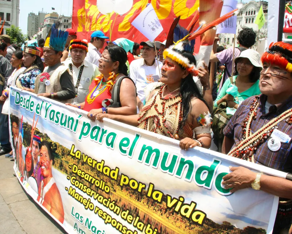 "Desde El Yasuni Para El Mundo." Indigenous environmental activists from Yasuni, Ecuador relay a message to the world for the urgent protection of the Yasuni Amazon region from oil drilling. Photo credit: Hoda Baraka 
