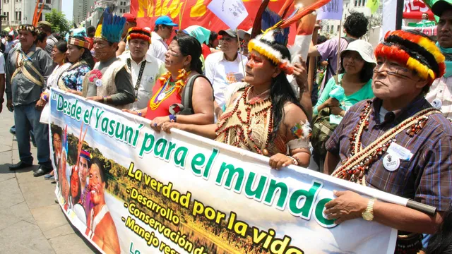 "Desde El Yasuni Para El Mundo." Indigenous environmental activists from Yasuni, Ecuador relay a message to the world for the urgent protection of the Yasuni Amazon region from oil drilling. Photo credit: Hoda Baraka 