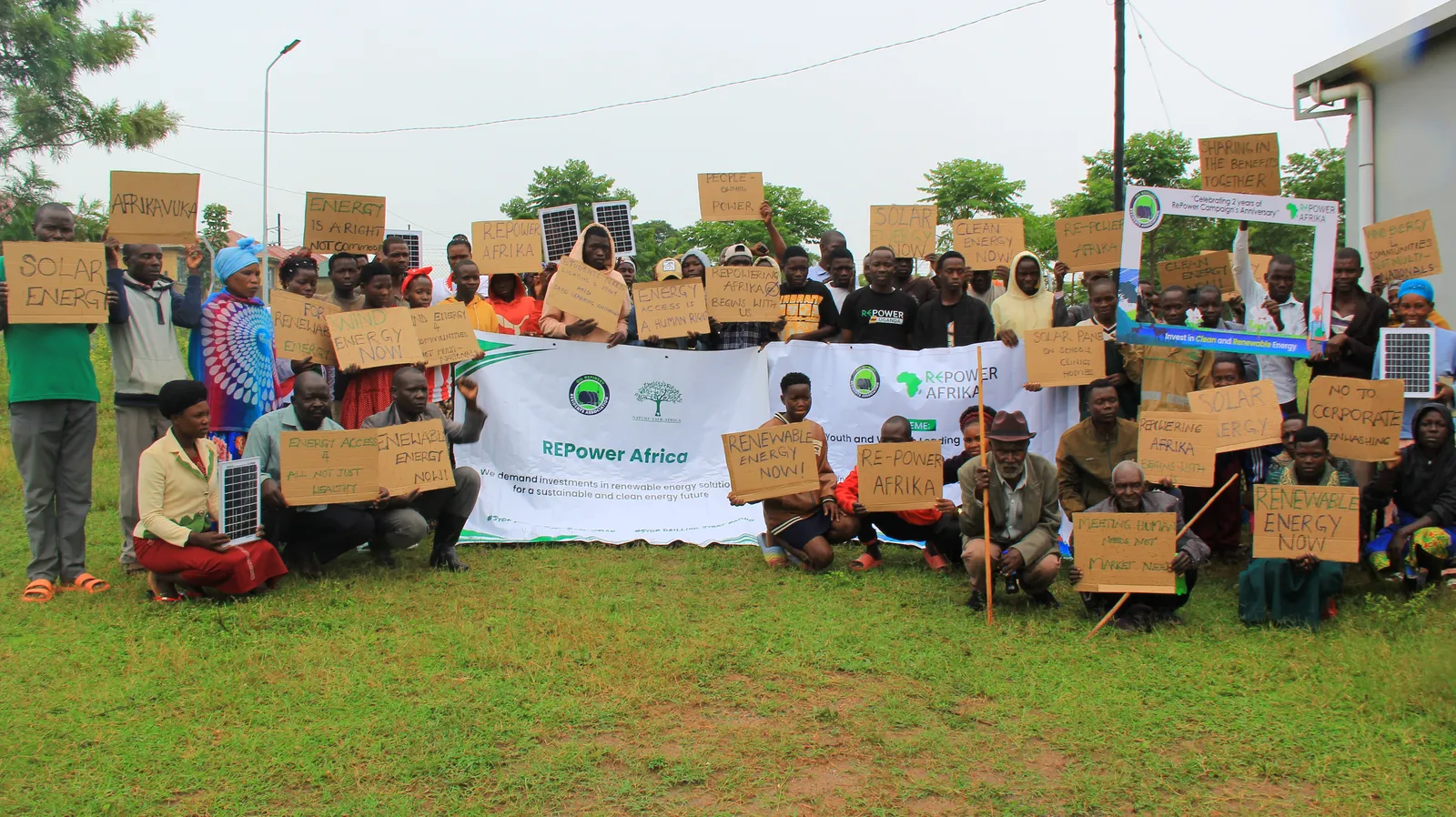 Community gathering in Kyakaboga Resettlement Village, photo credit: Chris Opio