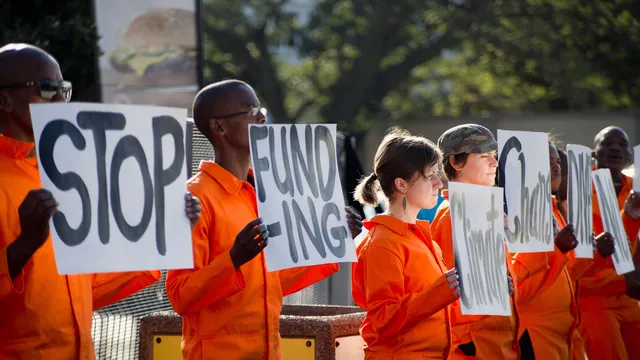 Johannesburg-activists-protest-local-banks-funding-fossil-fuel-projects-2015-©-Shayne-Robinson.jpg