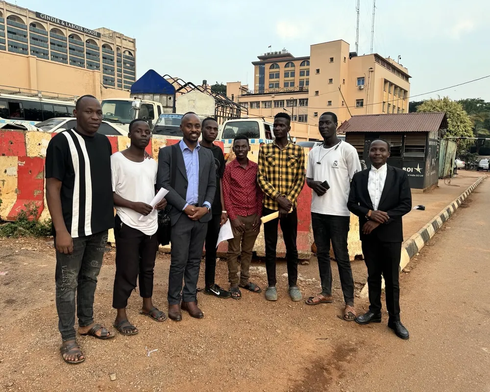 Two Ugandan Stop EACOP activists released on 14th August, with their lawyers and supporters.