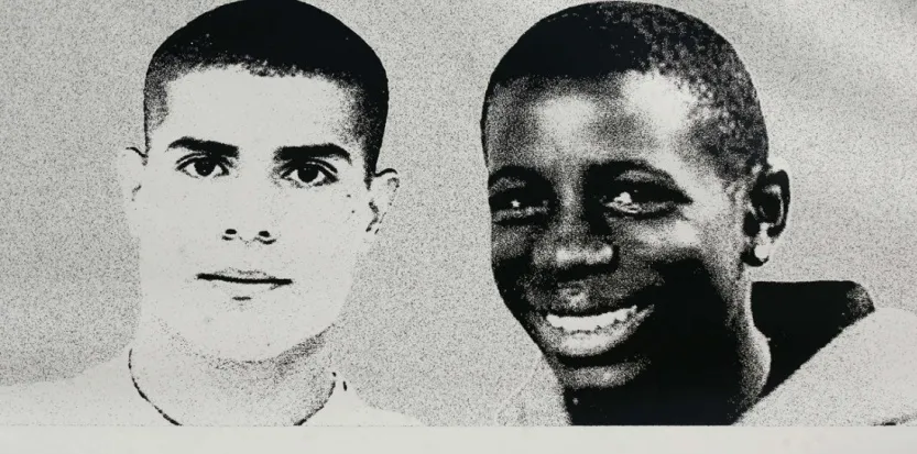 TO GO WITH AFP STORY BY EVE SZEFTEL (FILES) - A picture taken on November 4, 2006 in Clichy-sous-Bois, northern Paris, shows a giant picture of Zyed (L) and Bouna, the two teenagers whose death led France in 2005 to a nationwide wave of riots, on the sidelines of the "Diversity national day", focusing on "the diversity in the suburbs' housing estate". Two French policemen are due to stand trial in March 2015 over the deaths of the two teenagers who were electrocuted in 2005 while hiding in a power substation after running away from police, triggering riots across France. AFP PHOTO OLIVIER LABAN-MATTEI
