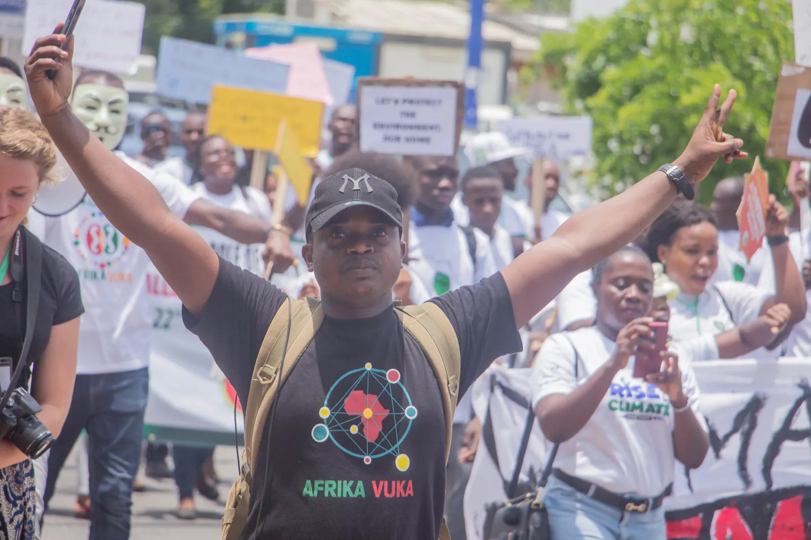 People march in Accra during the Africa Climate Week, in March 2019