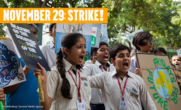 Two children protesting in New Delhi at the last climate strike with text: November 29: Strike!