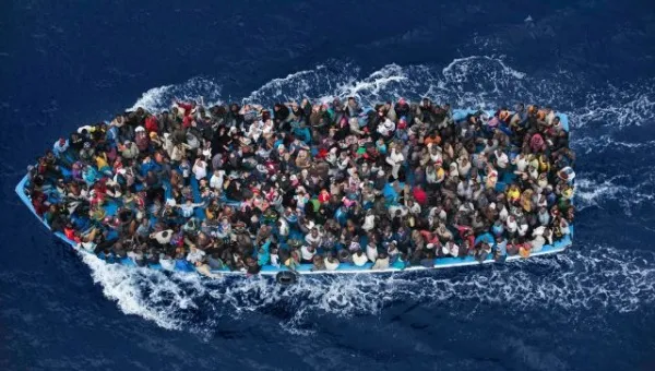 A boat carrying migrants in the Mediterranean, February 12, 2015. | Photo: Reuters