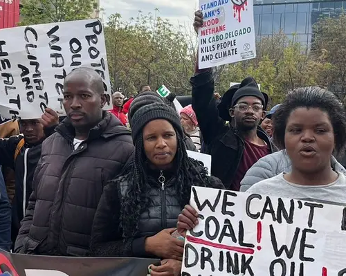 People gather outside Standard Bank in Johannesburg