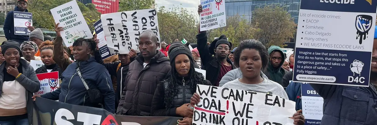 People gather outside Standard Bank in Johannesburg