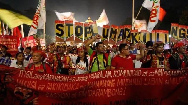 Indigenous groups from the Philippines protesting their right to life, land, and justice, resisting the abuses they face from the government and mining corporations. Photo: AC Dimatatac