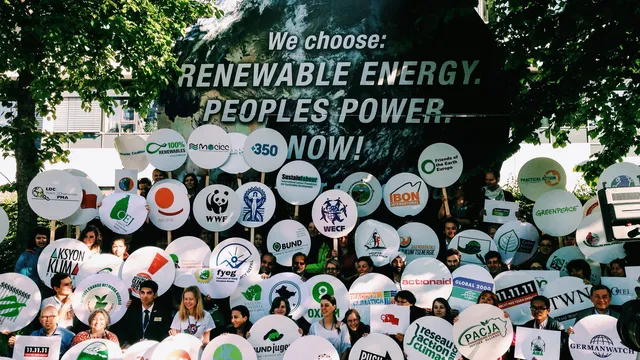 Civil Society organisations pictured outside the UN climate negotiations in Bonn today (Friday 6 June 2014) calling on governments to “stand with us or step aside”. Photo credit: Hoda Baraka