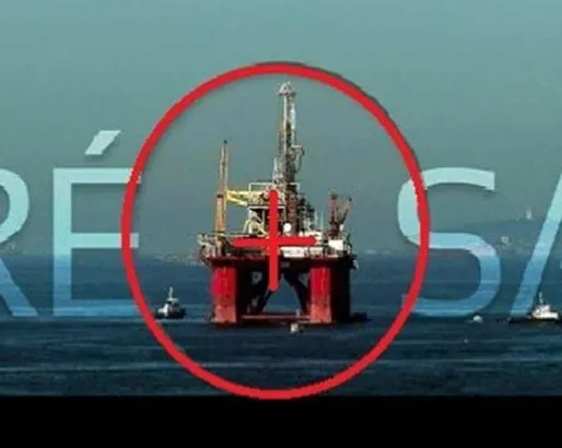 A red offshore oil drilling platform circled in red on calm ocean waters, with French text "PRE-SAL" overlaid. Small support vessels visible nearby under a hazy sky.