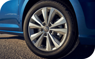 Picture of designer wheel rim and disc brakes the Volkswagen Golf