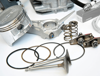 Internal engine parts like these will last longer after a proper break in procedure Internal engine parts including a piston and valves