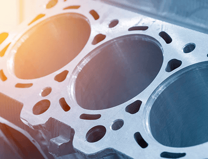 With the cylinder head removed, we can see into this engine block and the cylinders where combustion takes place With the cylinder head removed, we can see into this engine block and the cylinders where combustion takes place