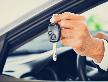 Person holding a key