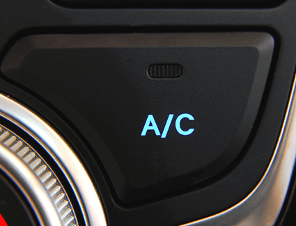 Pressing this button in your car should cause cold air to come pouring through the vents -- unless you're in need of A/C system repair Pressing this button in your car should cause cold air to come pouring through the vents -- unless you're in need of A/C system repair