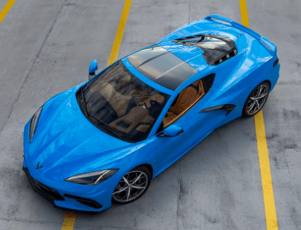 Photo of the new 2023 Corvette Stingray 3LT coupe in Rapid Blue taken from above.