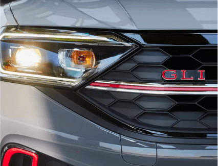 New 2023 Volkswagen Jetta GLI performance image Closeup view of the 2023 Volkswagen Jetta GLI grill and headlight.