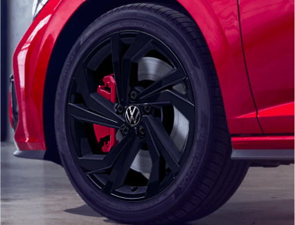 New 2023 Volkswagen Jetta GLI safety image Closeup view of the front brake caliper on a 2023 Volkswagen Jetta GLI.