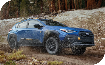 CPO Subaru Crosstrek Wilderness Driving on a Dirt Road