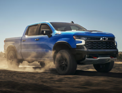 Front angle view of a white 2025 Chevrolet Silverado 1500