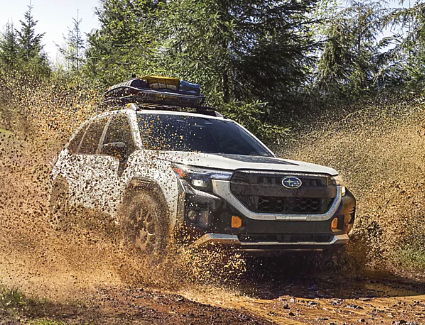 Photograph of a 2026 Subaru Forester Wilderness driving on the highway