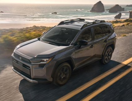 2026 Toyota Rav4 Hybrid driving on a dirt road