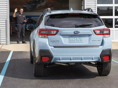 Subaru service image Subaru SUV arriving for service