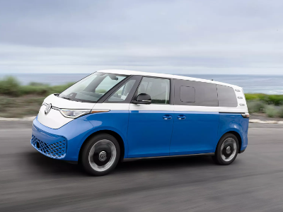 VW EV Van side image Electric VW Van driving on highway