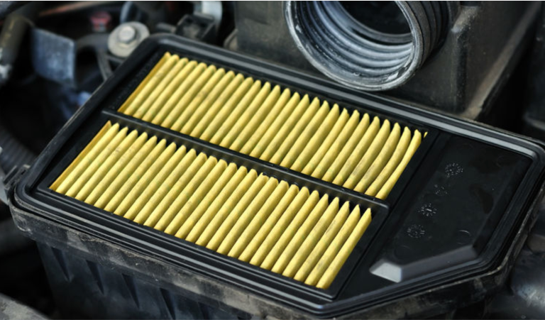Nissan hood open showing the engine air filter